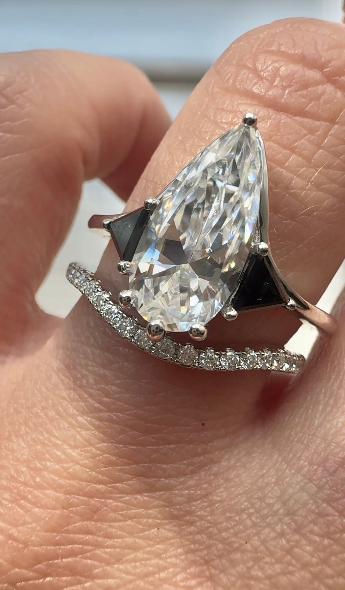 Moissanite Elongated Pear with Black Side Stones Engagement Ring