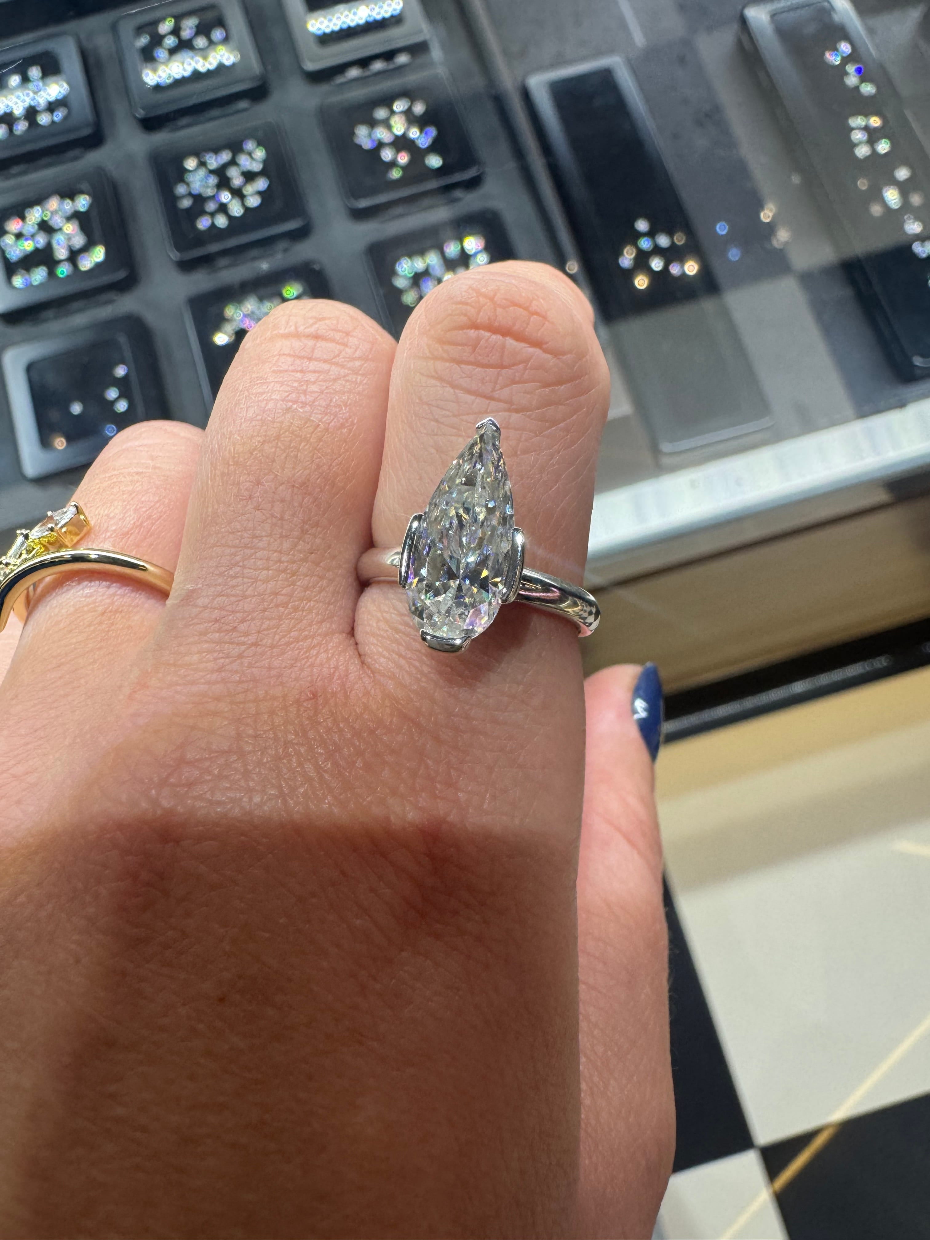 Moissanite Elongated Pear Bezel Prong Ring