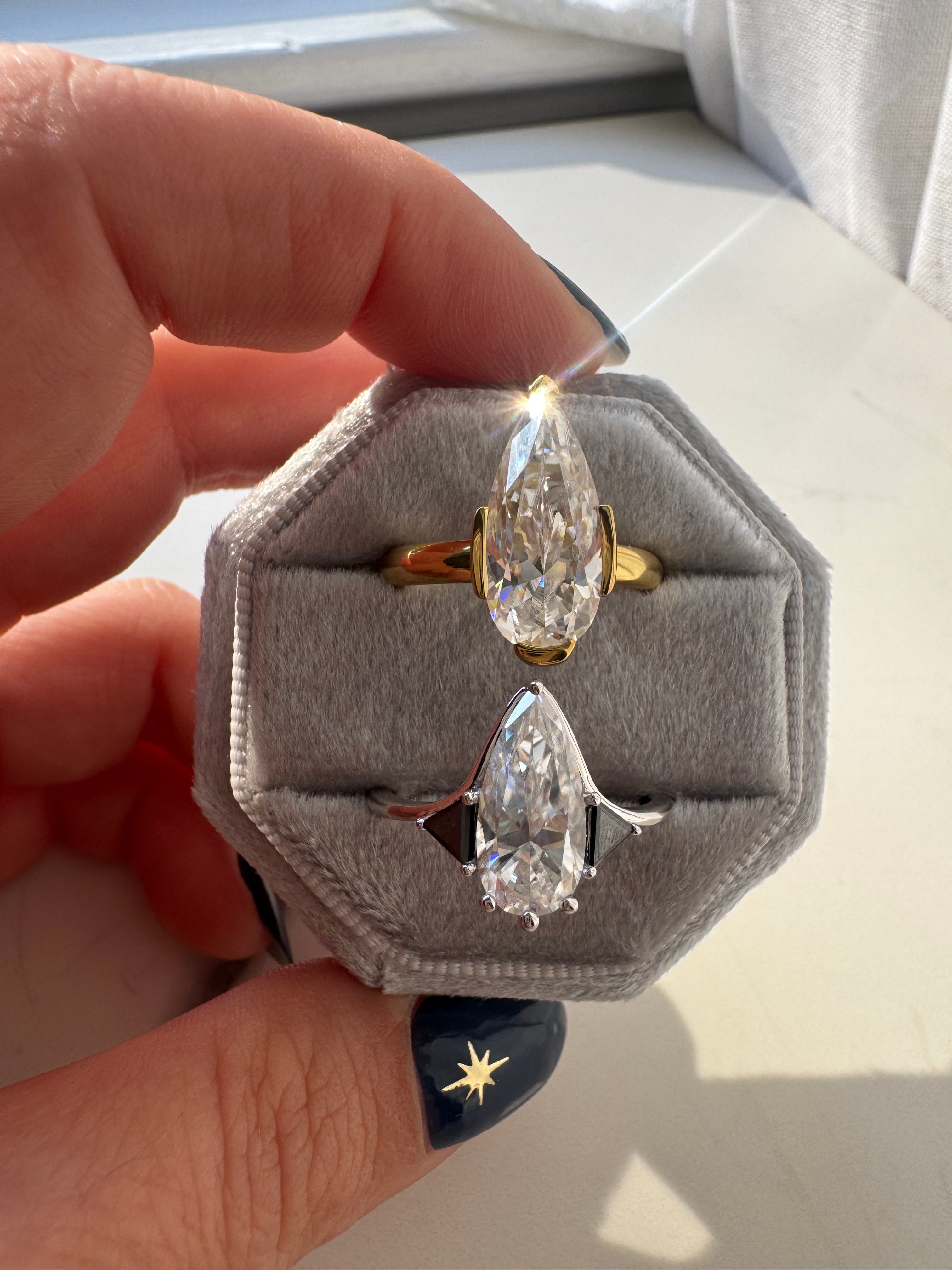 Moissanite Elongated Pear with Black Side Stones Engagement Ring