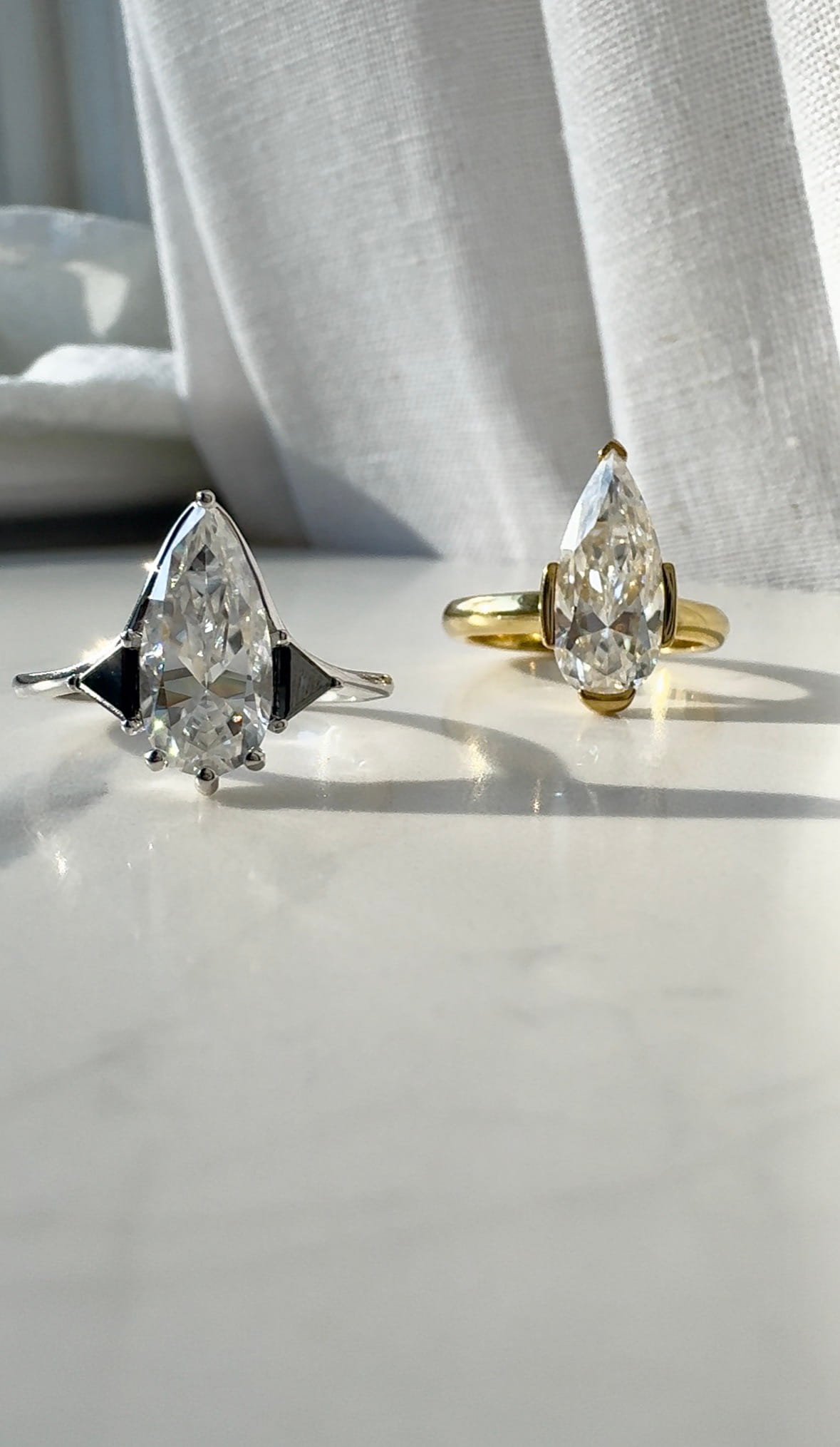 Moissanite Elongated Pear with Black Side Stones Engagement Ring