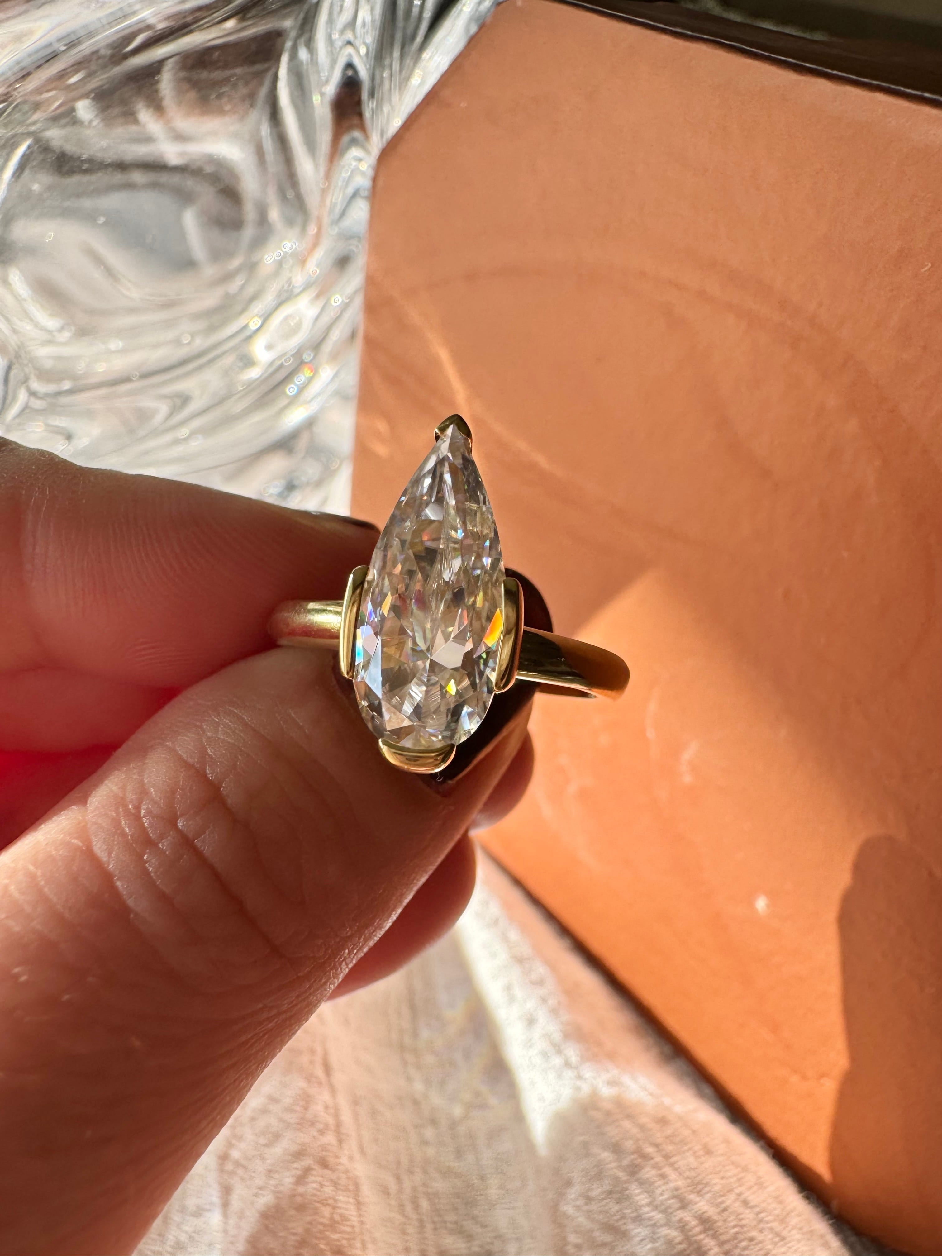 Moissanite Elongated Pear Bezel Prong Ring
