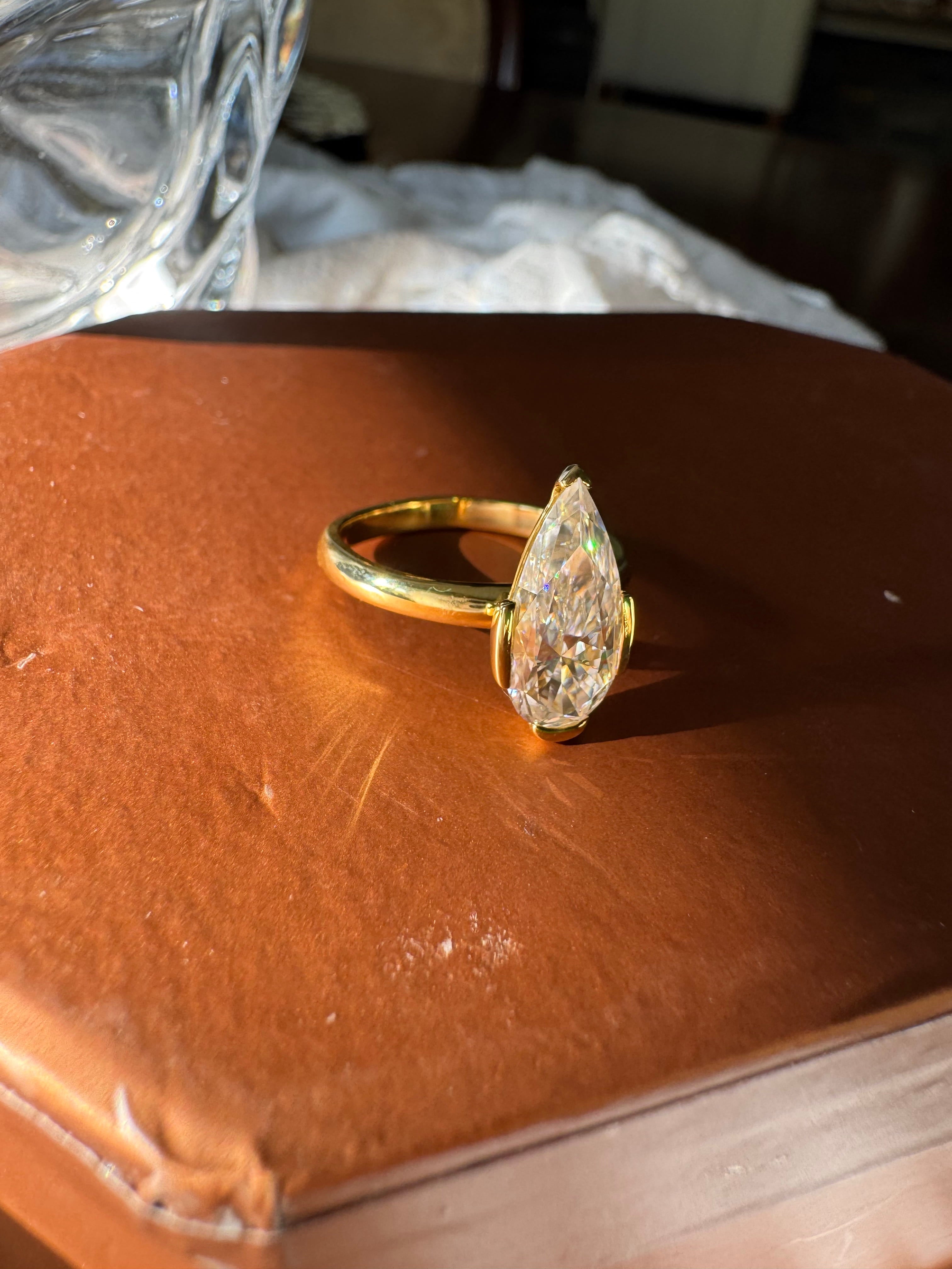 Moissanite Elongated Pear Bezel Prong Ring