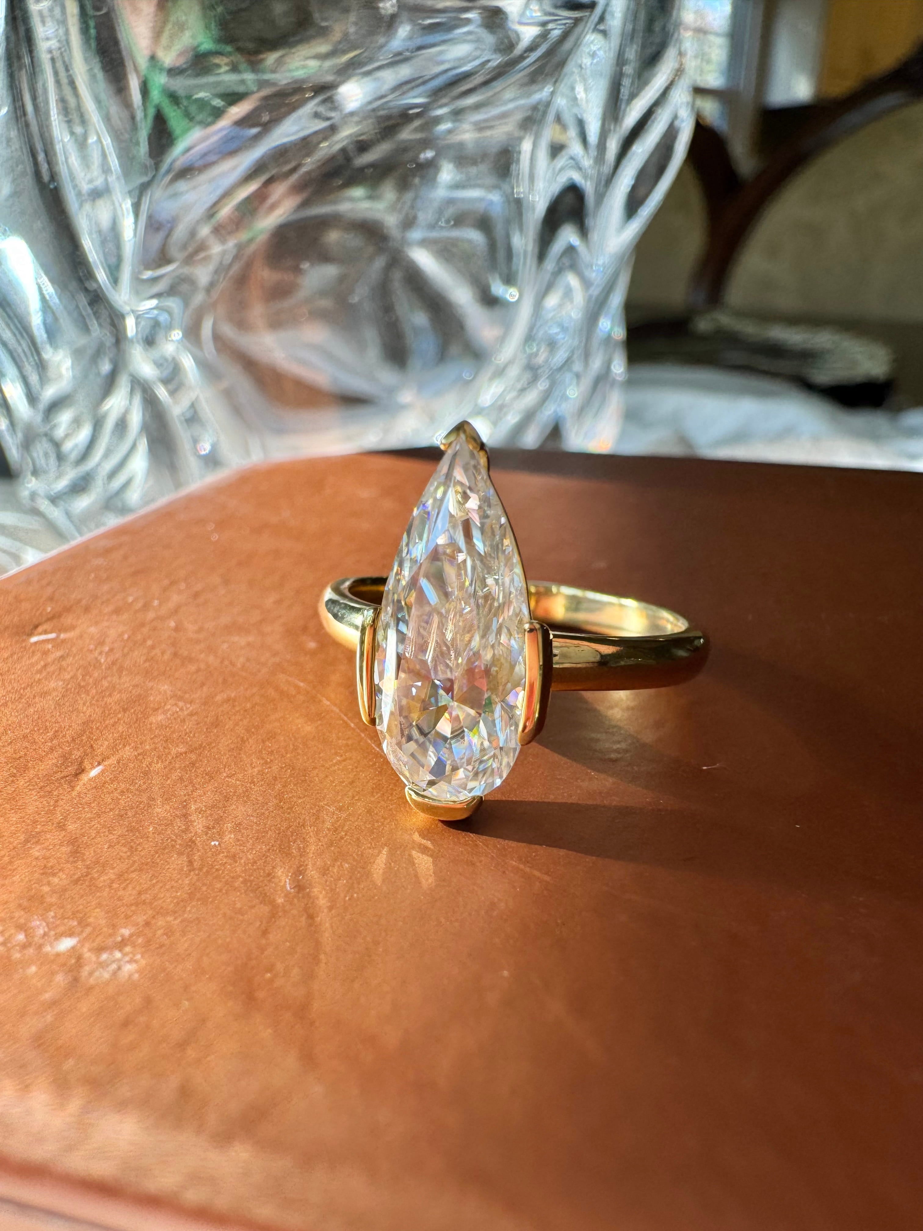 Moissanite Elongated Pear Bezel Prong Ring