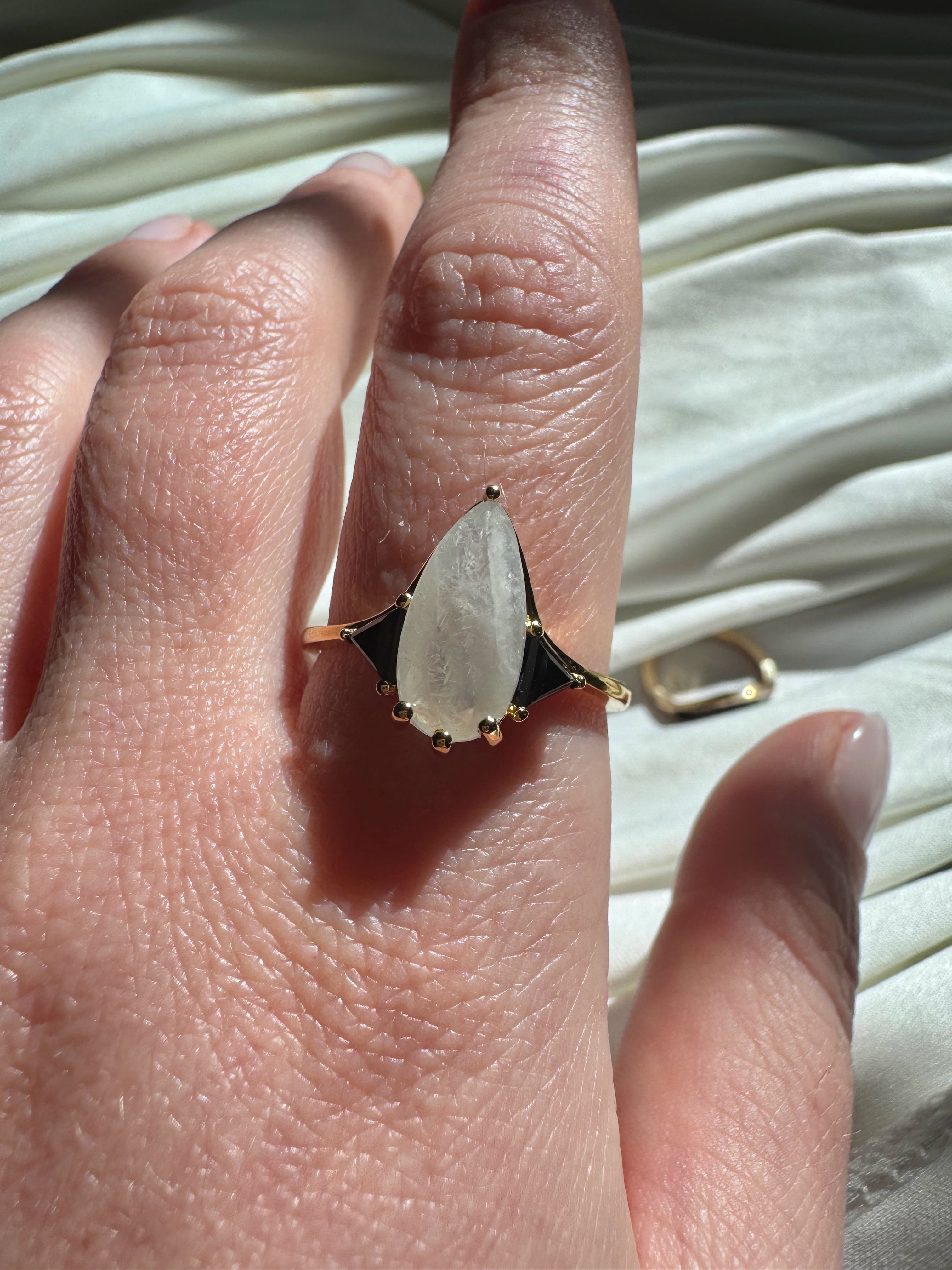 Moonstone Elongated Pear with Black Side Stones Engagement Ring