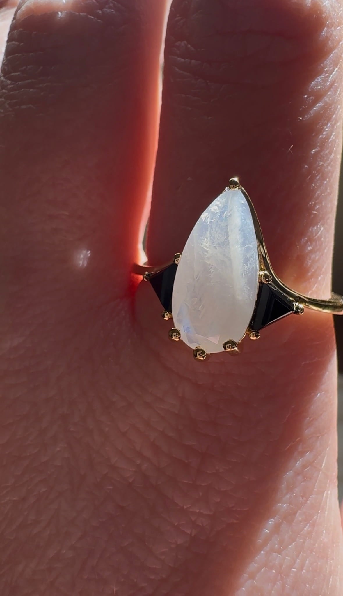 Moonstone Elongated Pear with Black Side Stones Engagement Ring