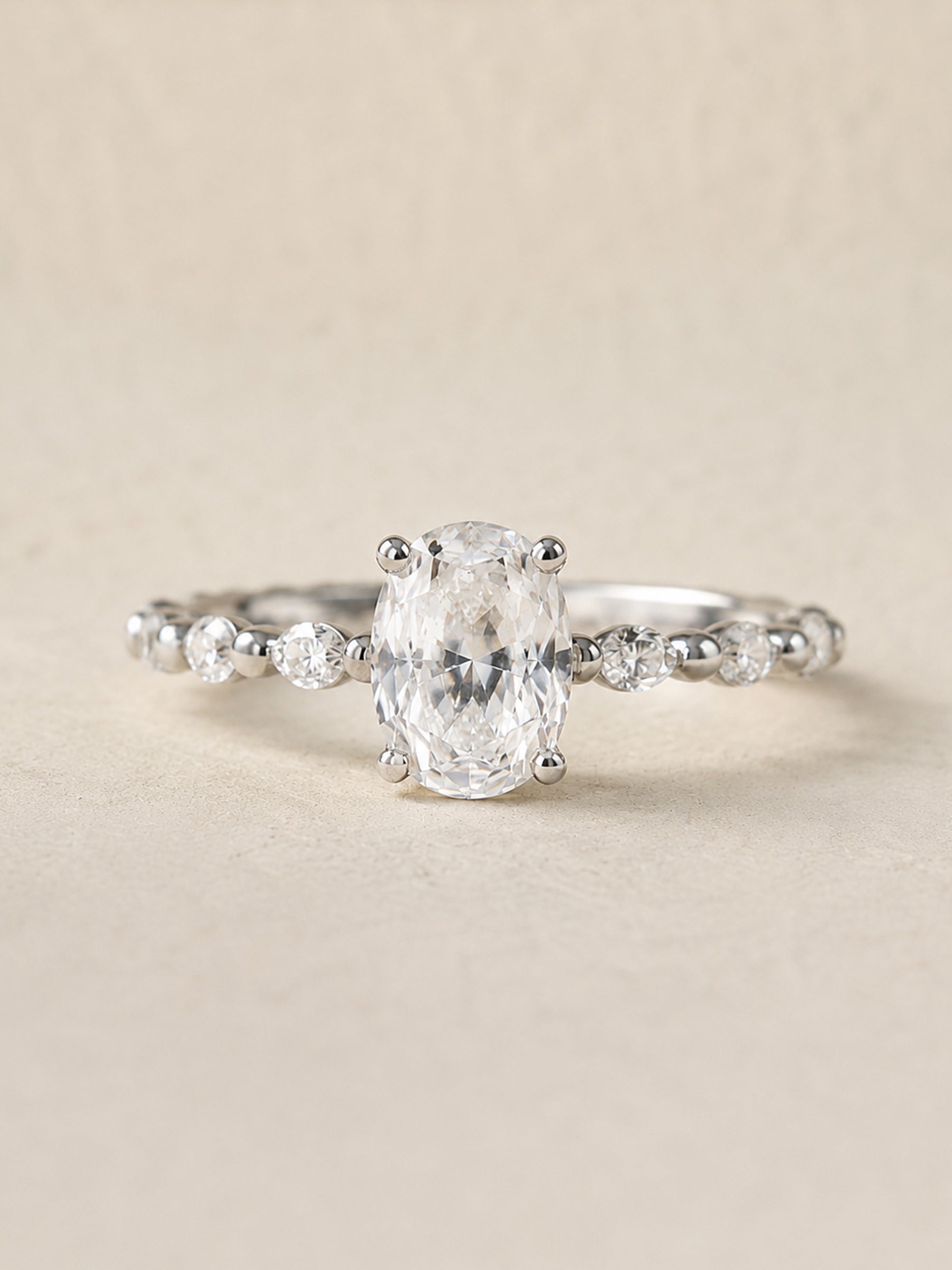 Oval Diamond Engagement Ring with Floating Side Stones