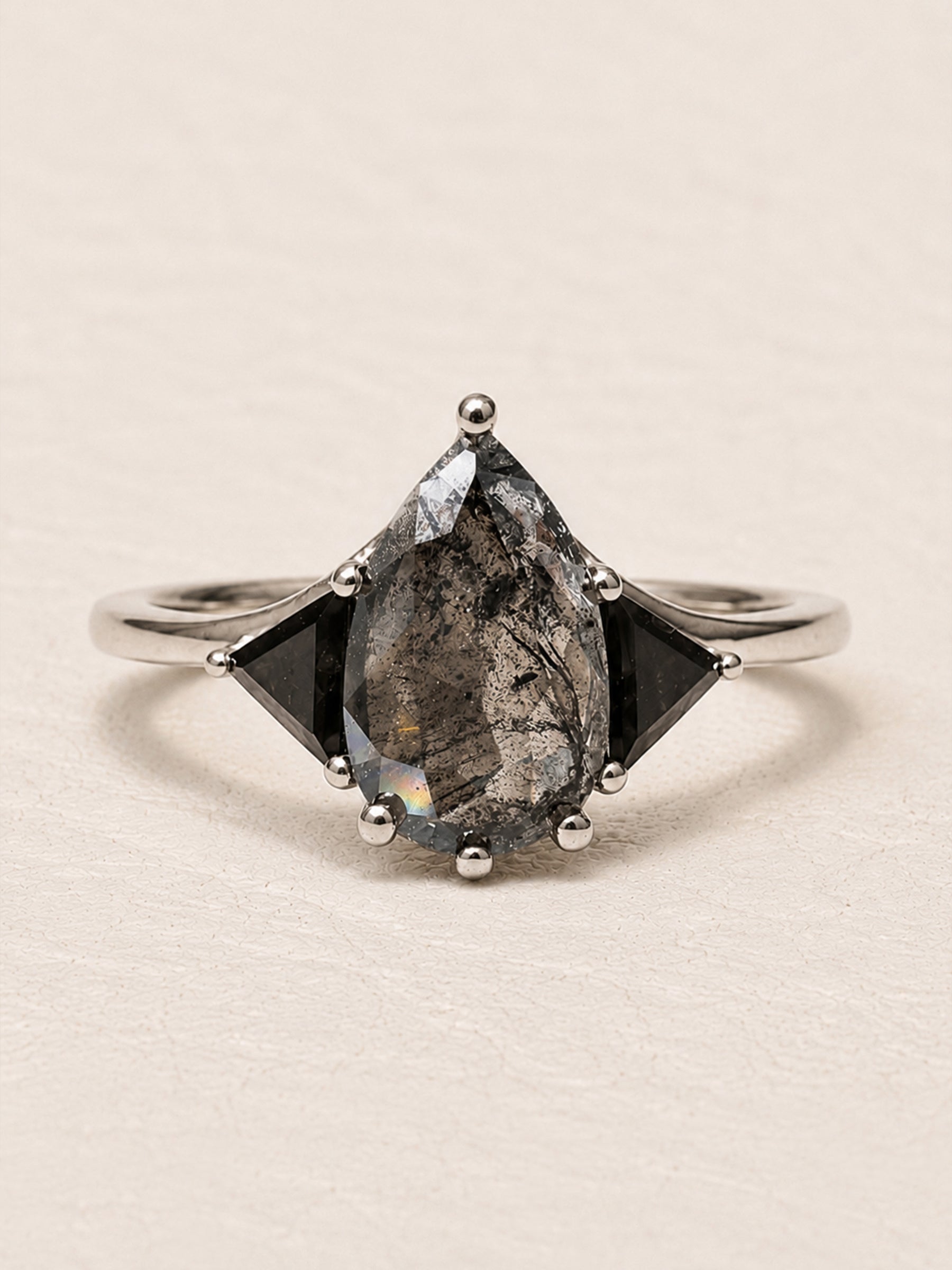 Pear Salt and Pepper Diamond Three Stone Engagement Ring
