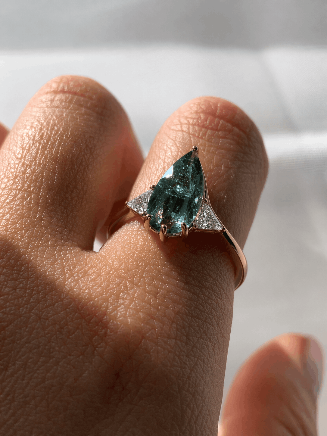 Blue Tourmaline Elongated Pear with White Diamond Side Stones Engagement Ring