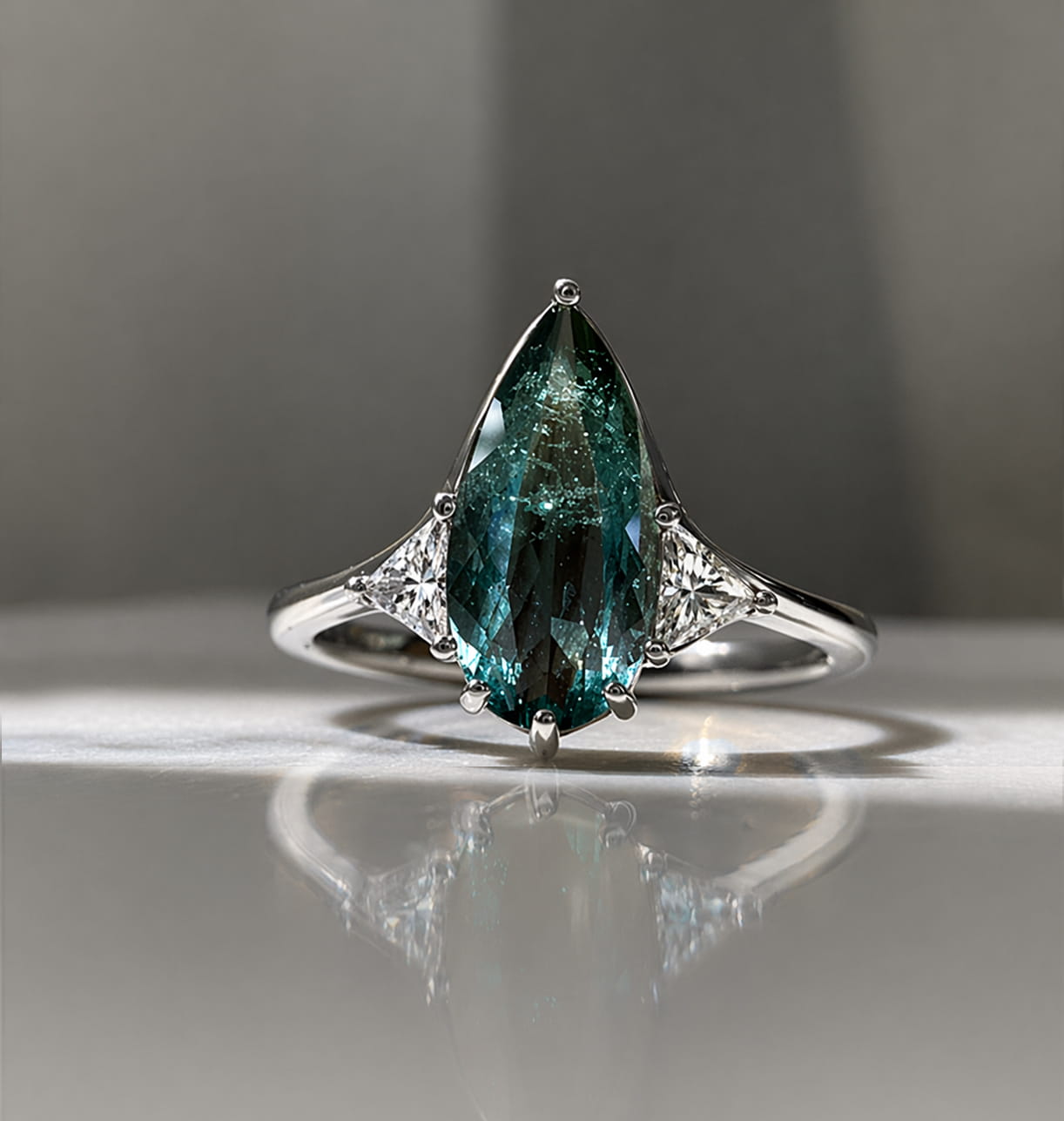 Blue Tourmaline Elongated Pear with White Diamond Side Stones Engagement Ring
