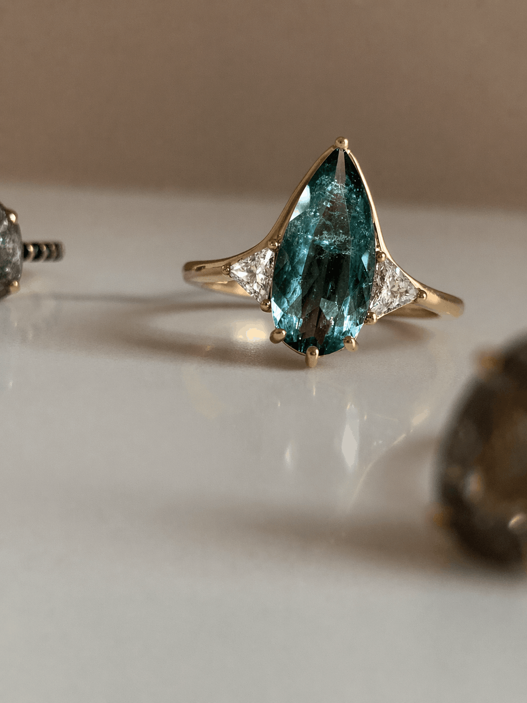 Blue Tourmaline Elongated Pear with White Diamond Side Stones Engagement Ring