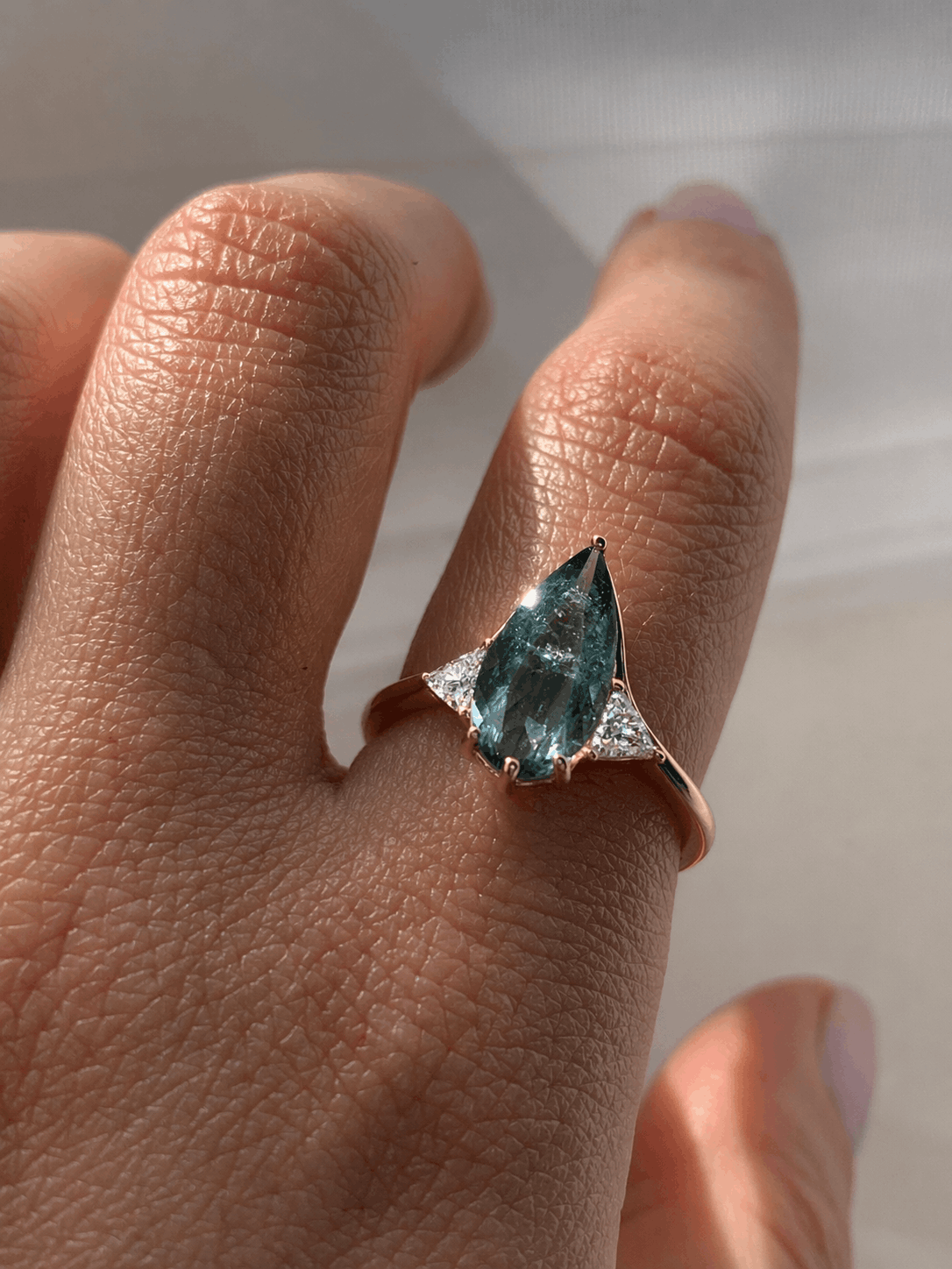 Blue Tourmaline Elongated Pear with White Diamond Side Stones Engagement Ring