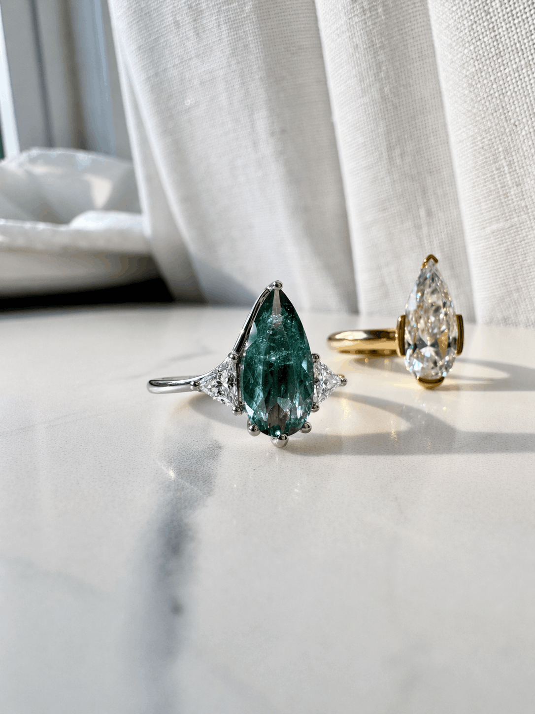 Blue Tourmaline Elongated Pear with White Diamond Side Stones Engagement Ring