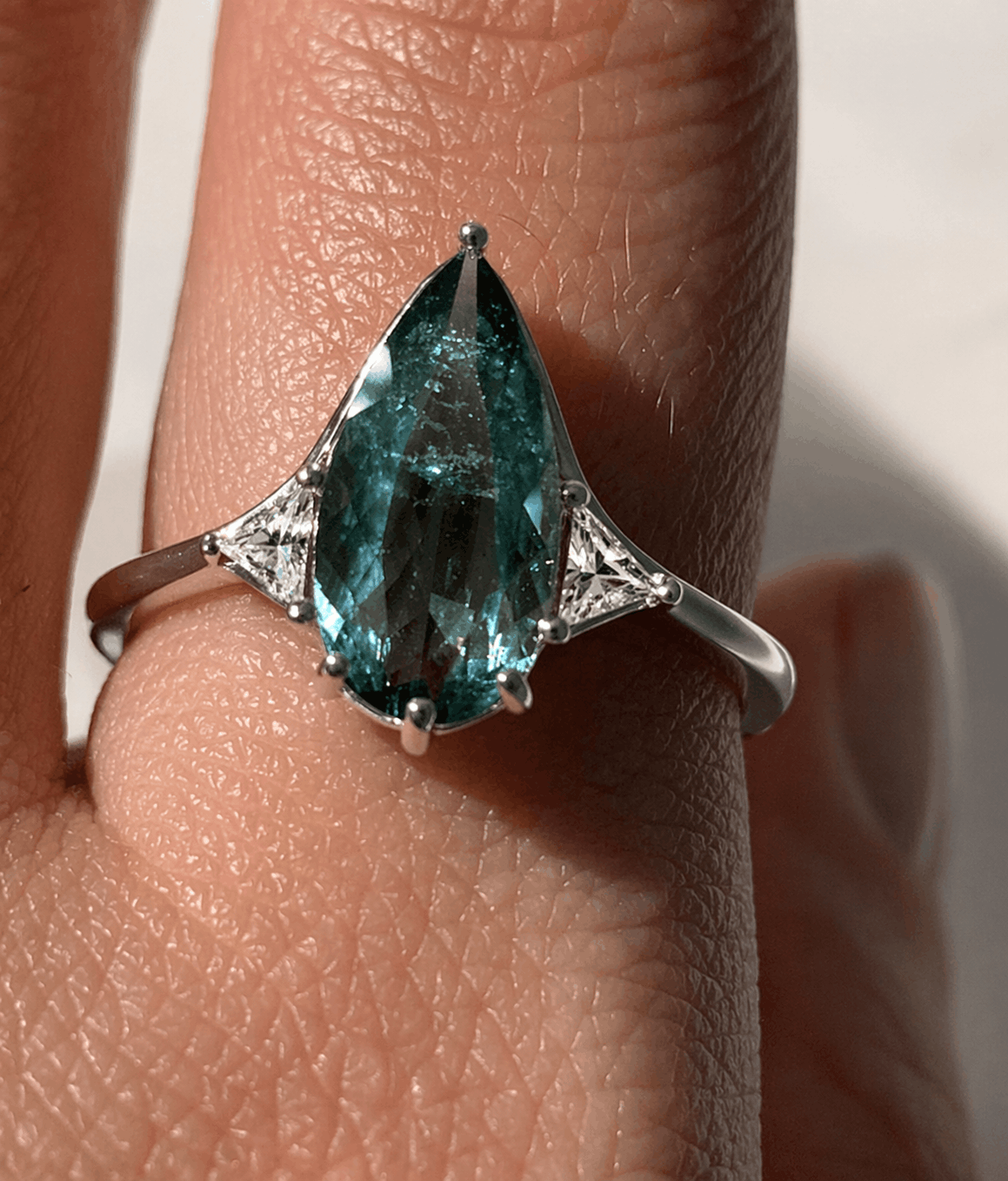 Blue Tourmaline Elongated Pear with White Diamond Side Stones Engagement Ring