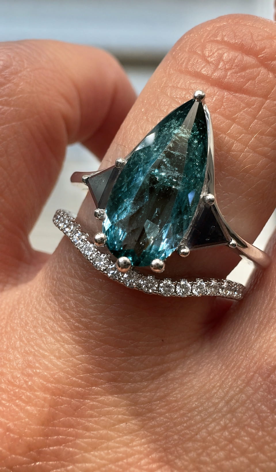 Blue Tourmaline Elongated Pear with Black Diamond Side Stones Engagement Ring