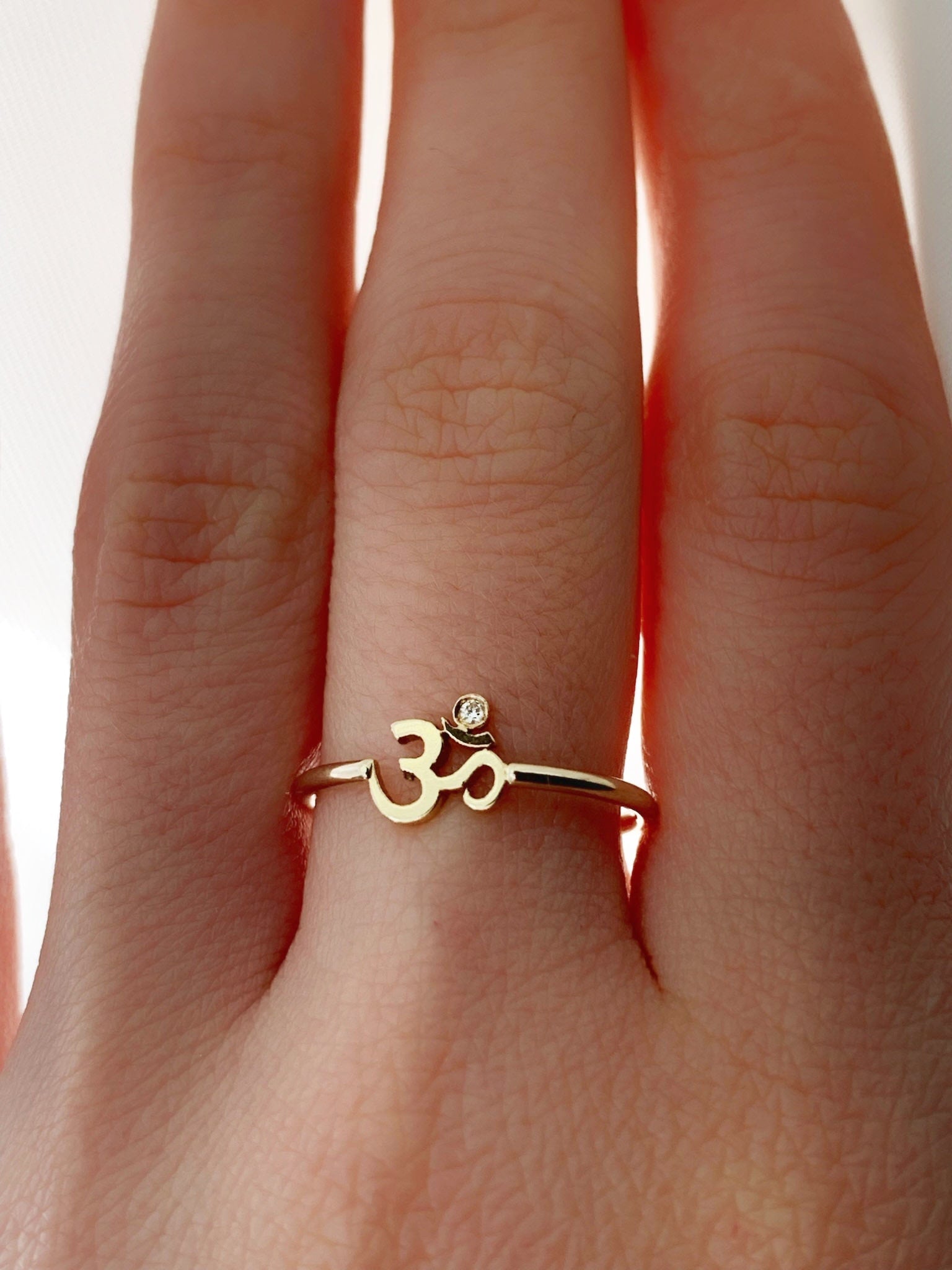 Om ring gold deals